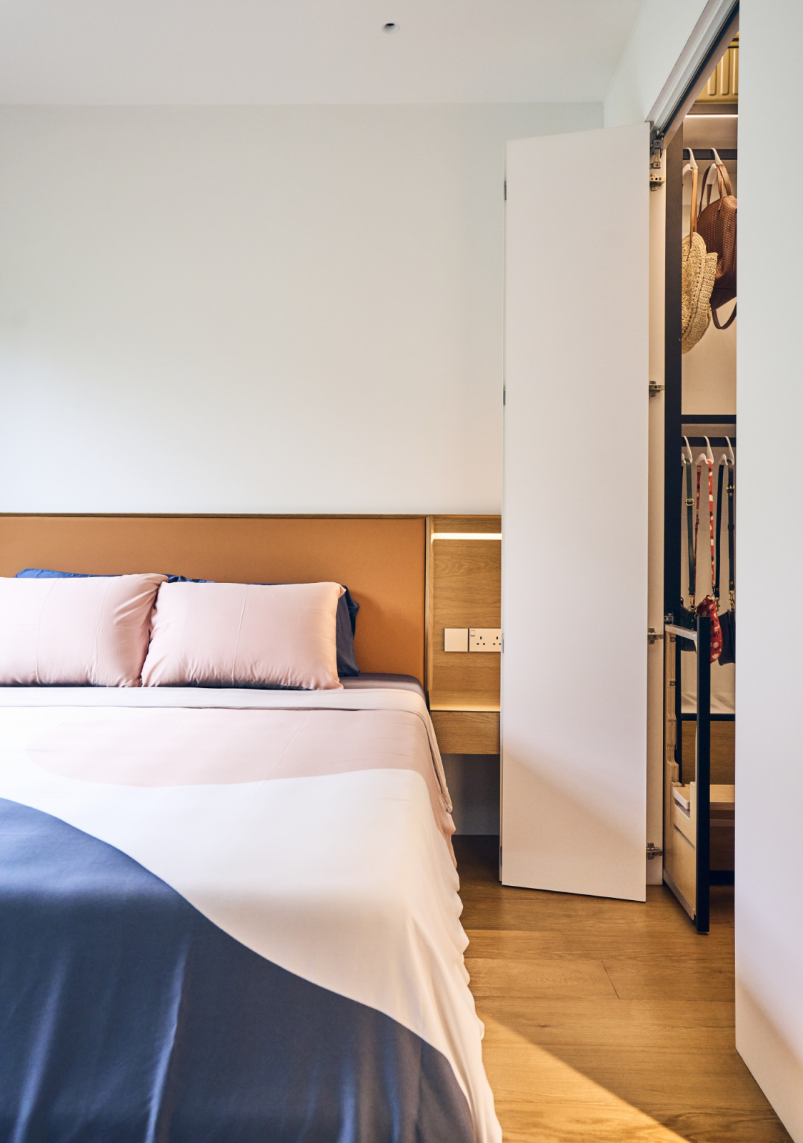 A new walk-in wardrobe was integrated into the master suite, concealed behind flush doors