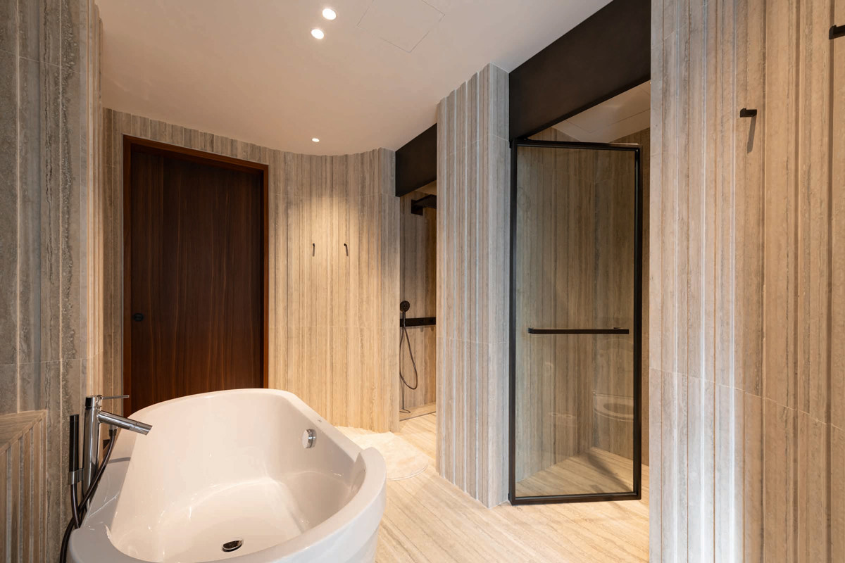 The master bathroom features separate shower and WC chambers