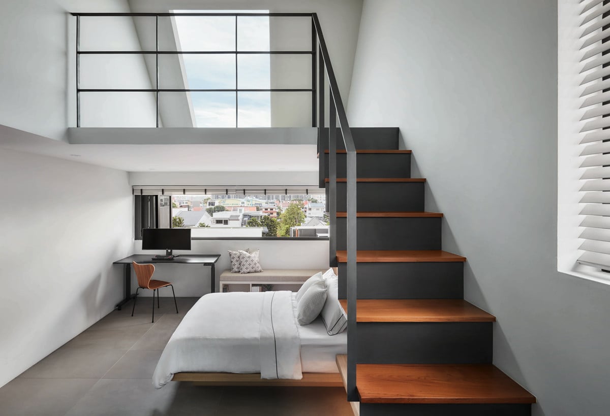This loft bedroom incorporates both a window and a skylight