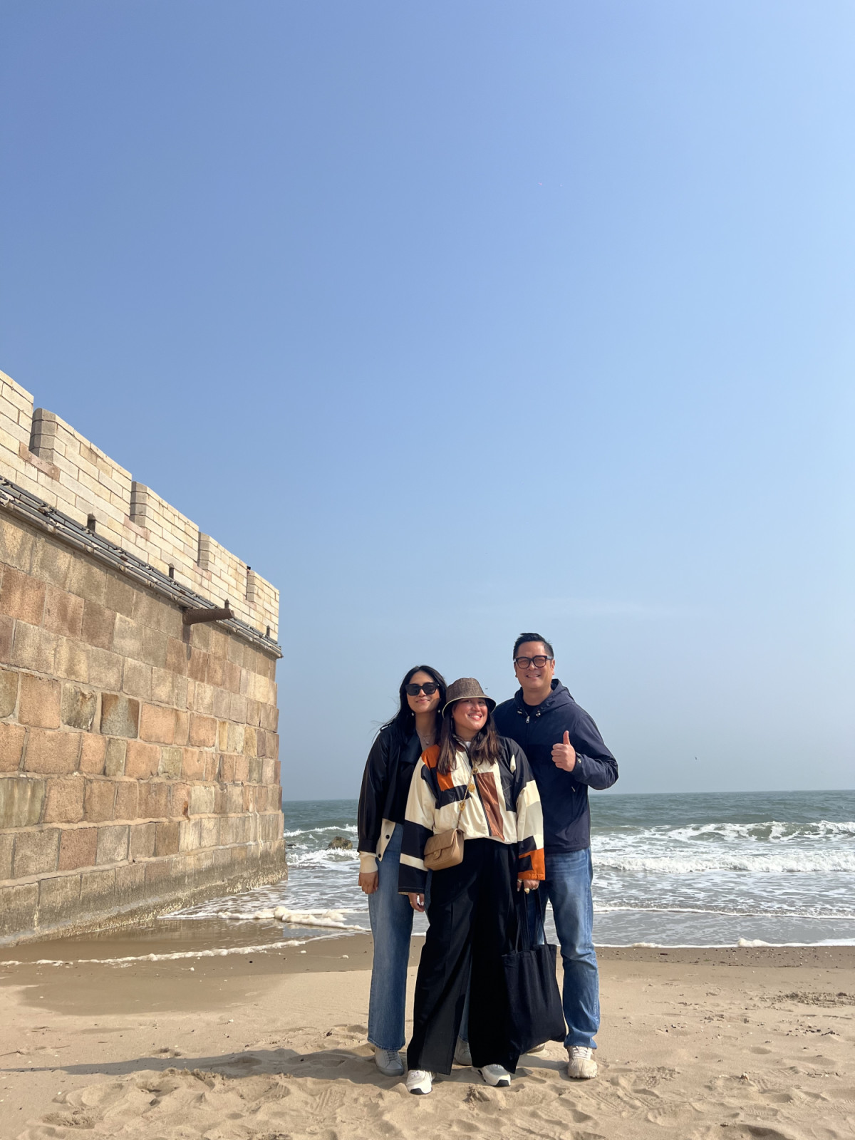 Alelee Andanar and her family in Laolongtou, China