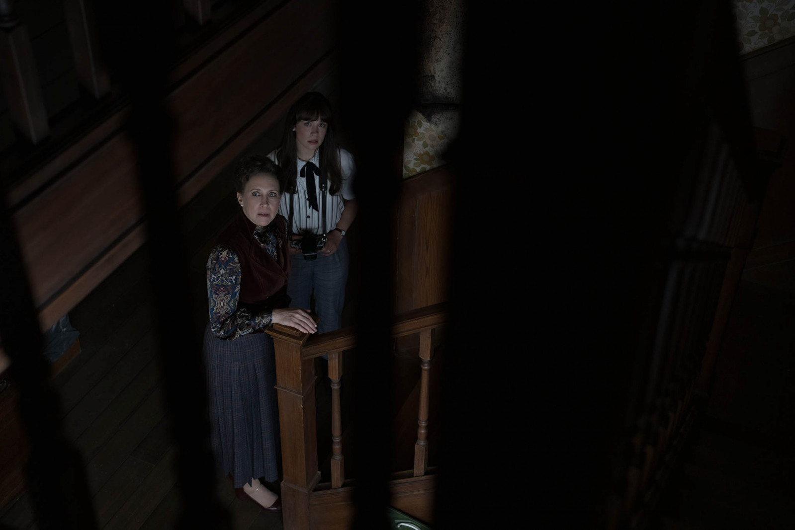 Lorraine and Judy Warren in the Smurl home in ‘The Conjuring: Last Rites’