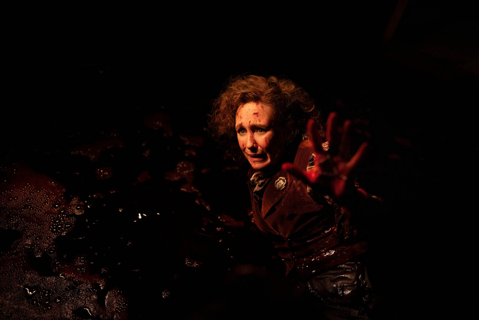 Lorraine faces one of the demons in the basement on ‘The Conjuring: Last Rites’