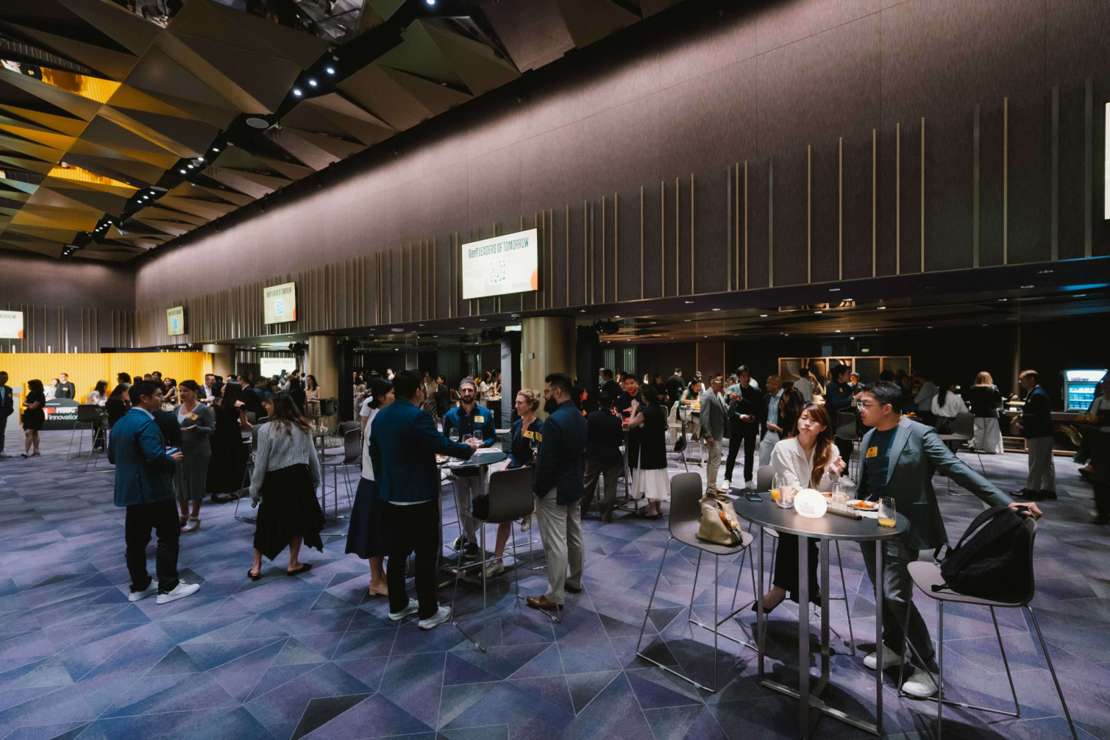Gen.T honourees from past editions mingle during a networking break (Photo: Jeffrey Hui)
