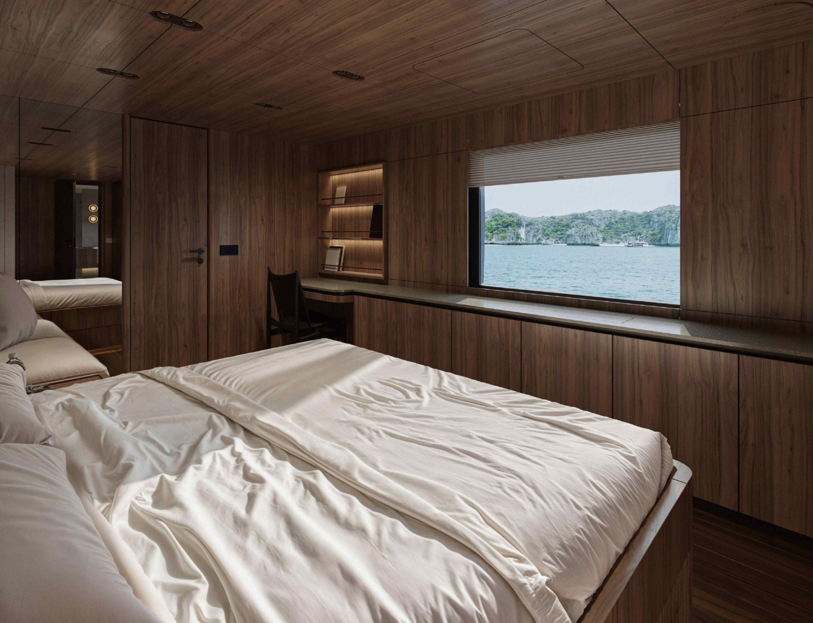 The interior palette features natural woods, soft neutral fabrics, and sleek metallics