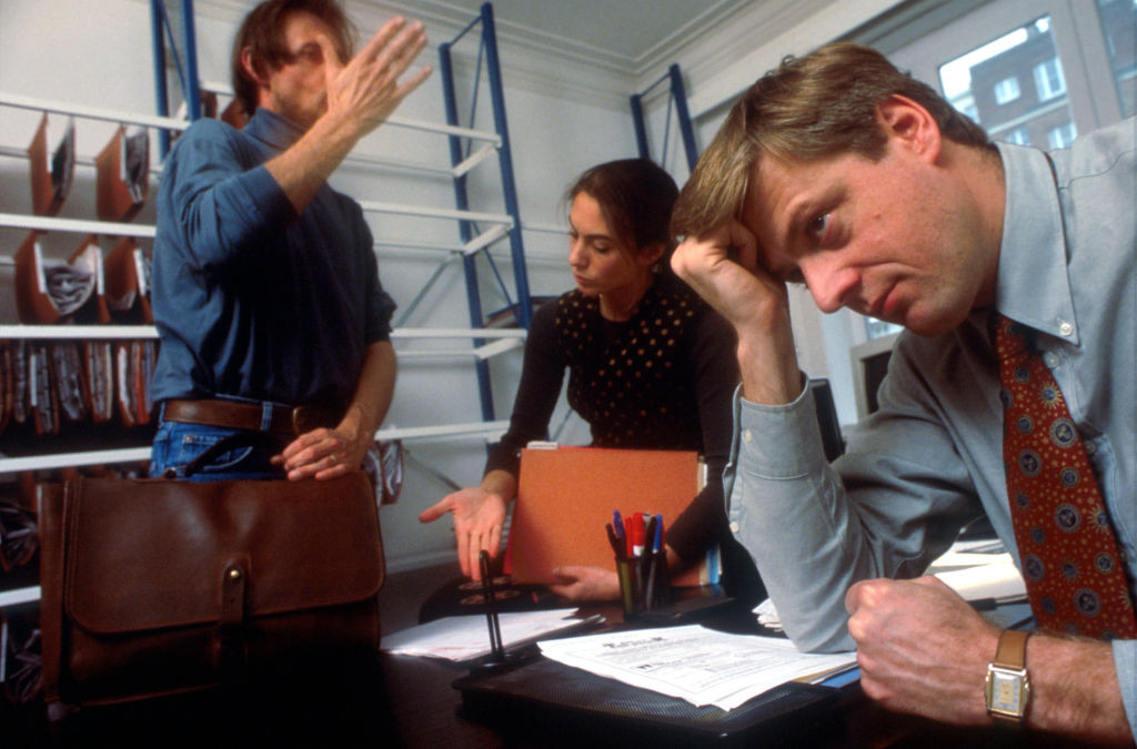 267558 01: Stressed business people at work. (Photo by Liaison)