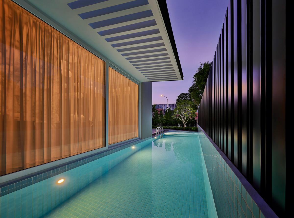 The terrace house’s pool area is tucked at the side of the site, ensuring privacy from the street