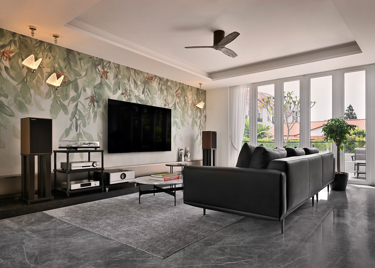 Foliage pattern on the wall is not wallpaper but large-format tiles from Hafary, selected for their biophilic appearance and ease of maintenance
