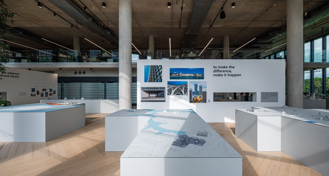 Exhibition visitors explore GDP Architects’ legacy through interactive displays featuring architectural models, master plans, and project photography that demonstrate the firm’s impact on Malaysian urban development across multiple cities