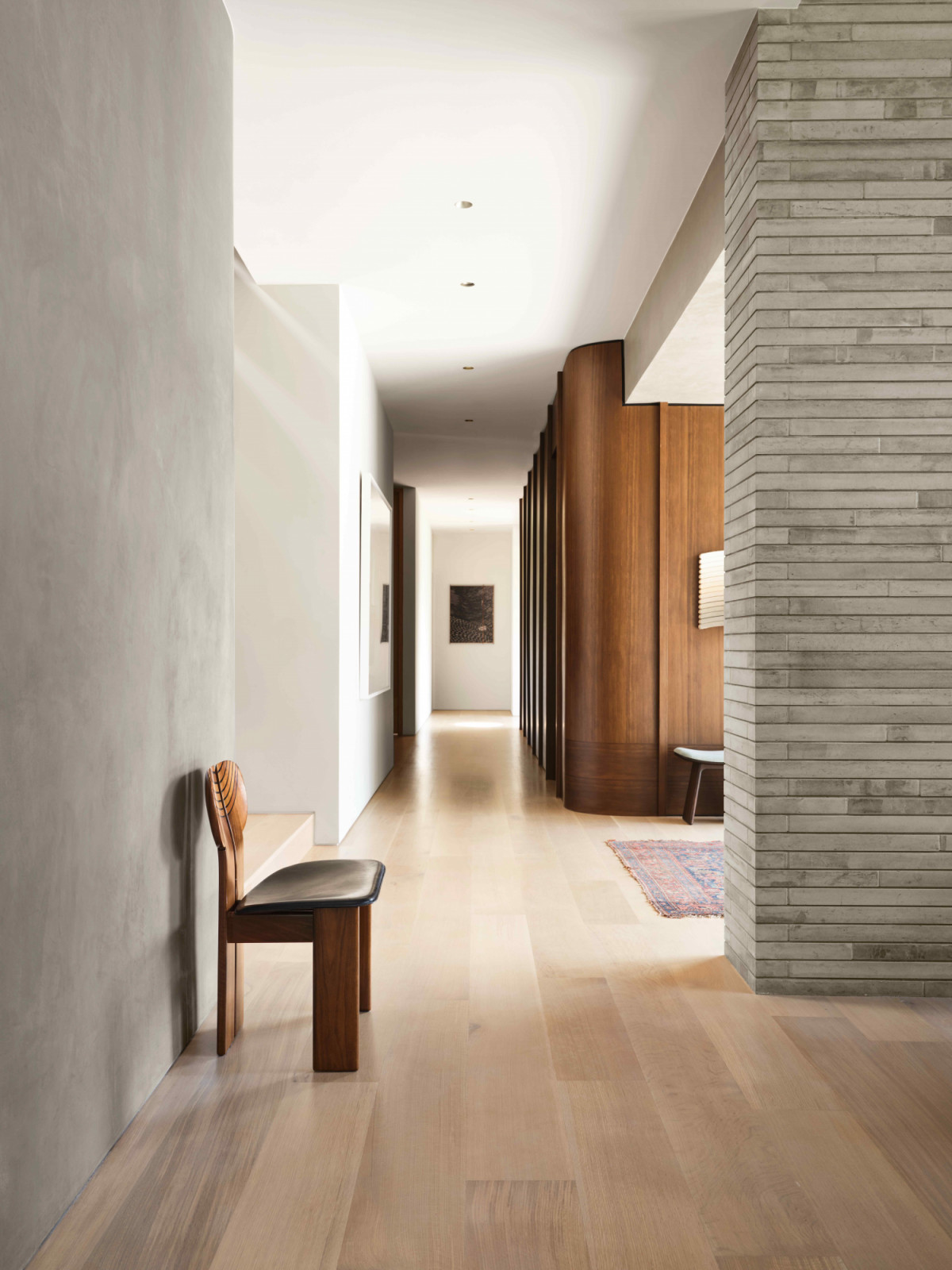 Rich, earthy hues such as grey limestone, wood panels and stucco