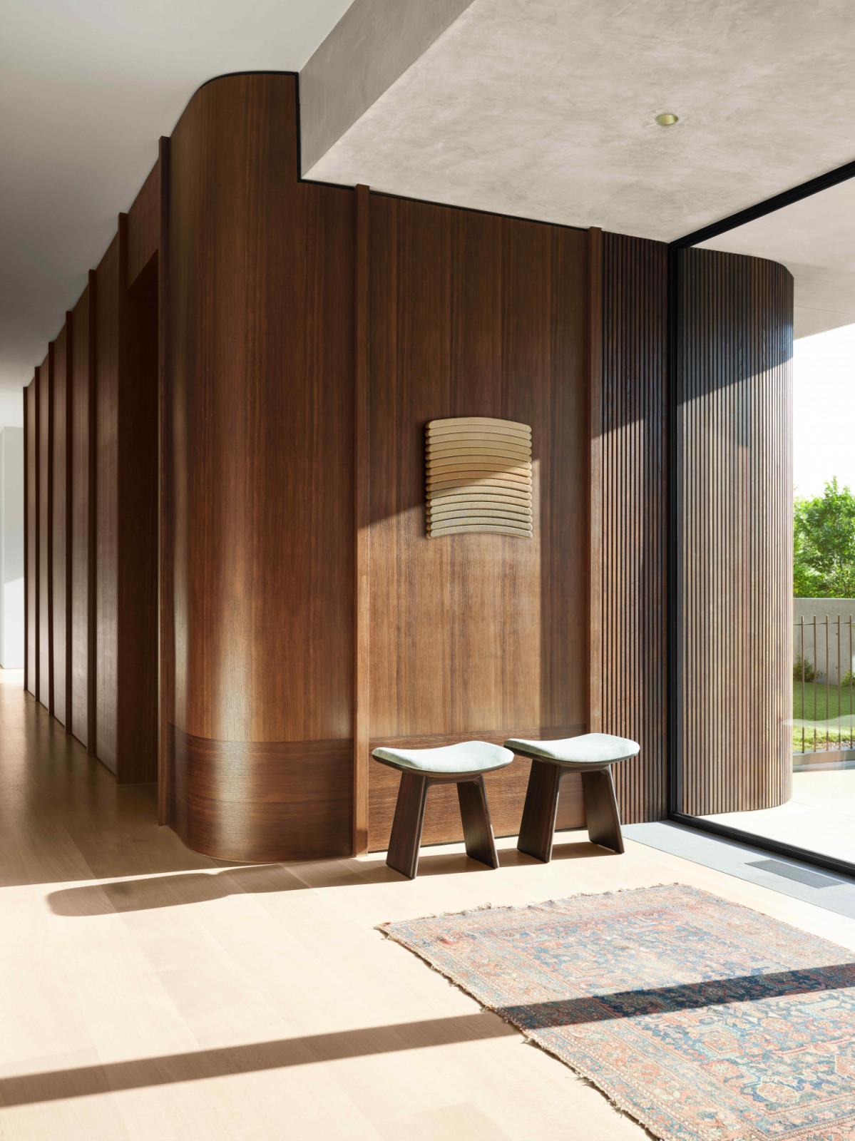 The fumed oak panelling in the entry with removeable battens