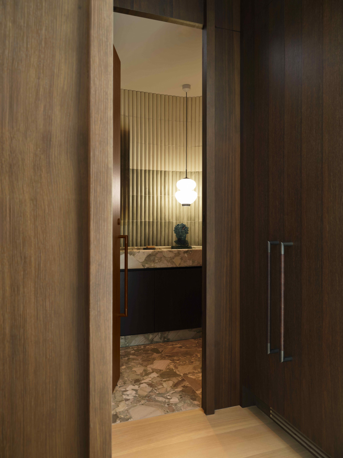 Every element in the powder room is entirely custom