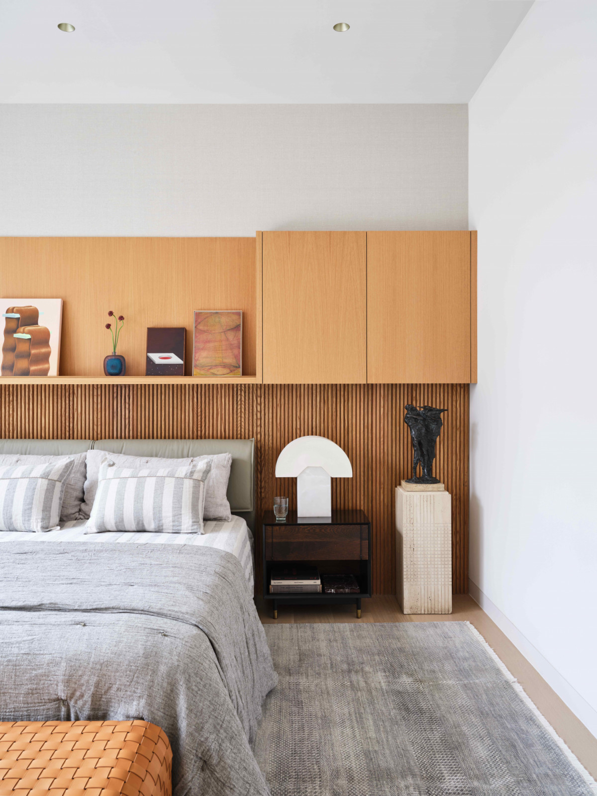 Sculptural and custom-designed furnishing in the bedroom