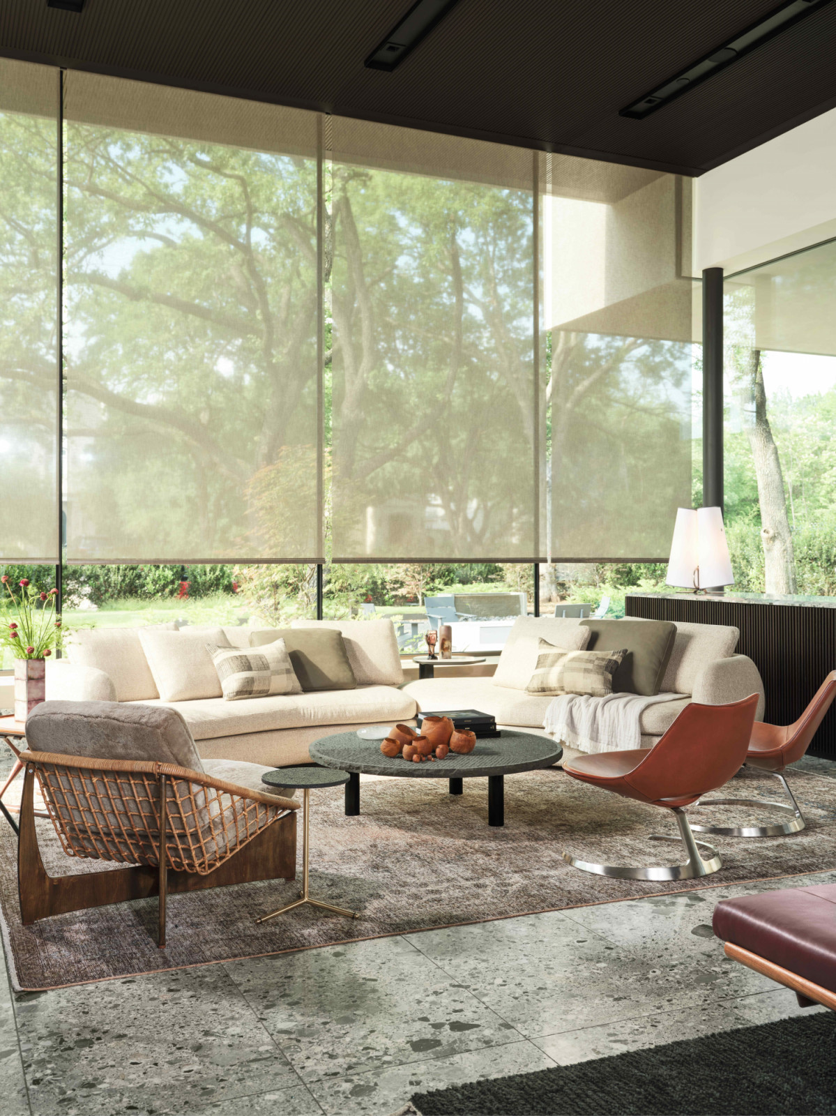 The light-filled living room with retractable screens