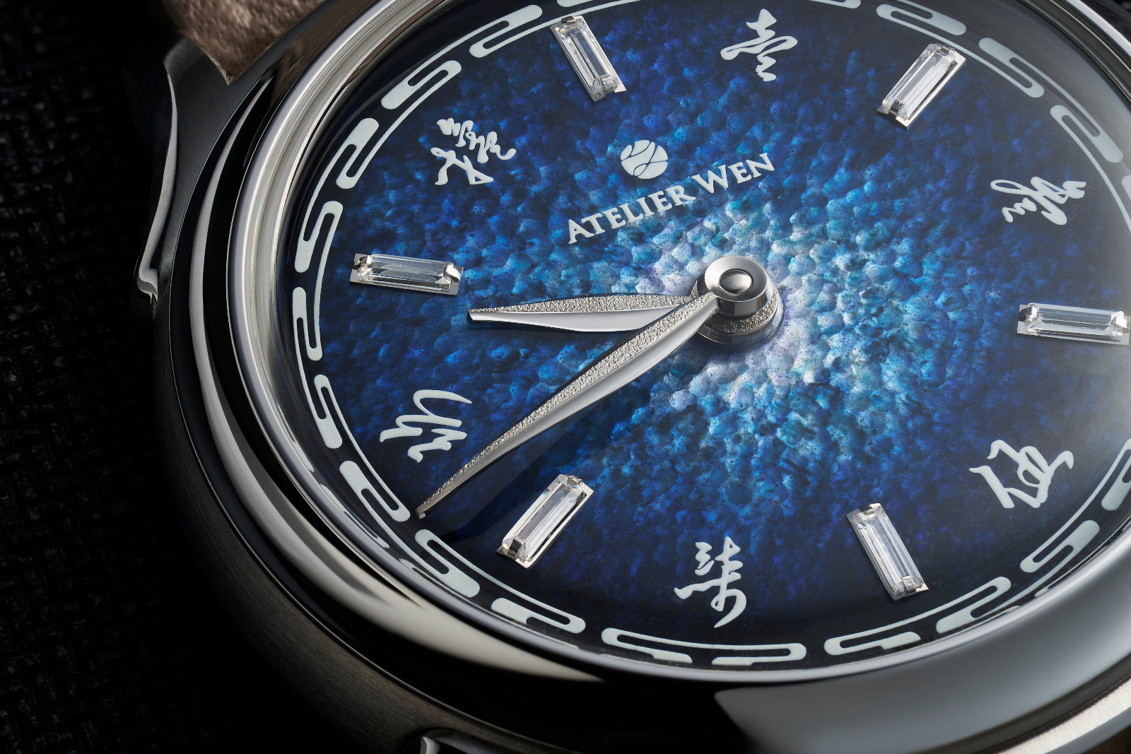 Atelier Jiāo with grand feu enamel dial and hour markers rendered in Chinese calligraphy