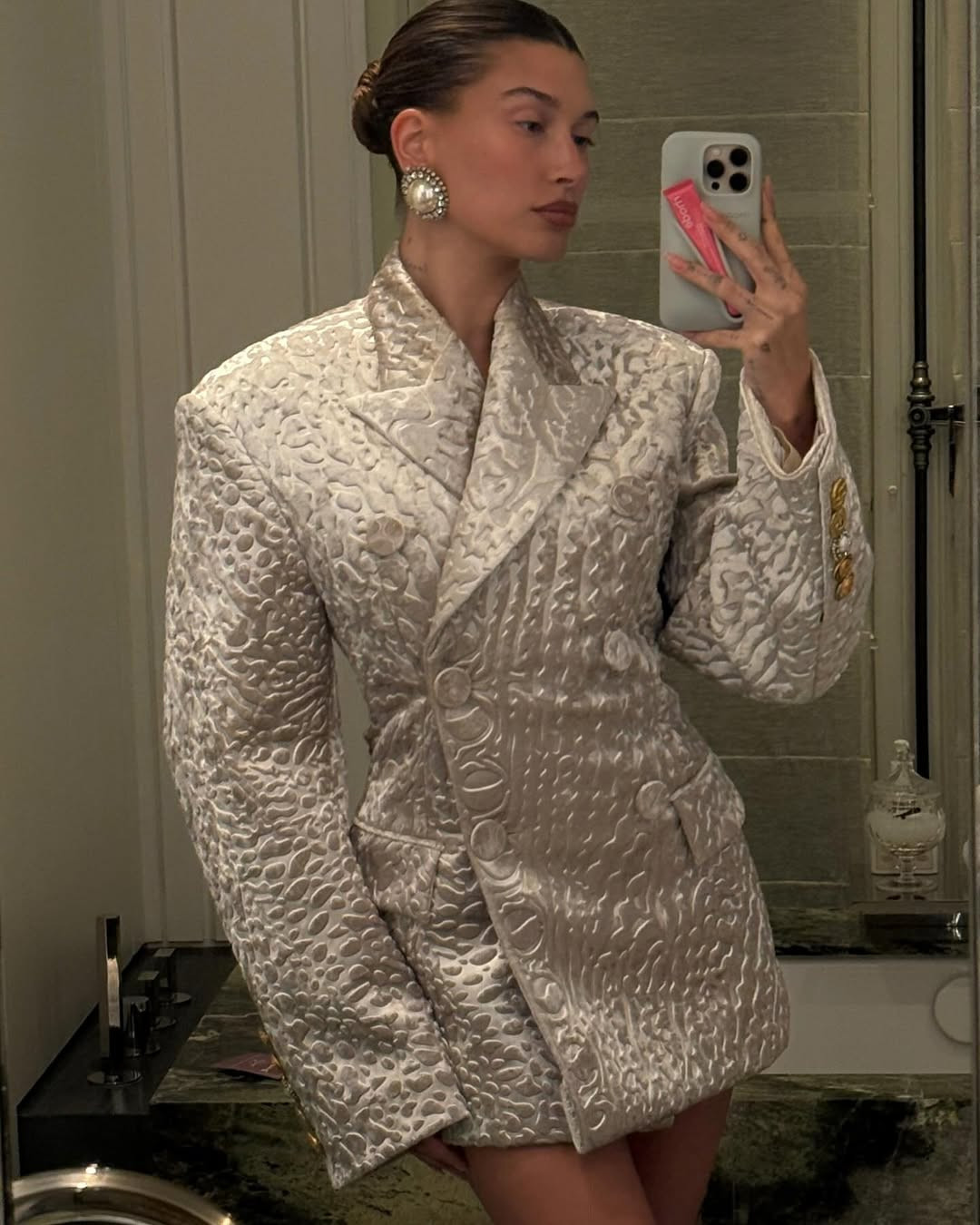 Rich fabrics add depth without weighing down the shape. (Photo: Hailey Bieber / Instagram)
