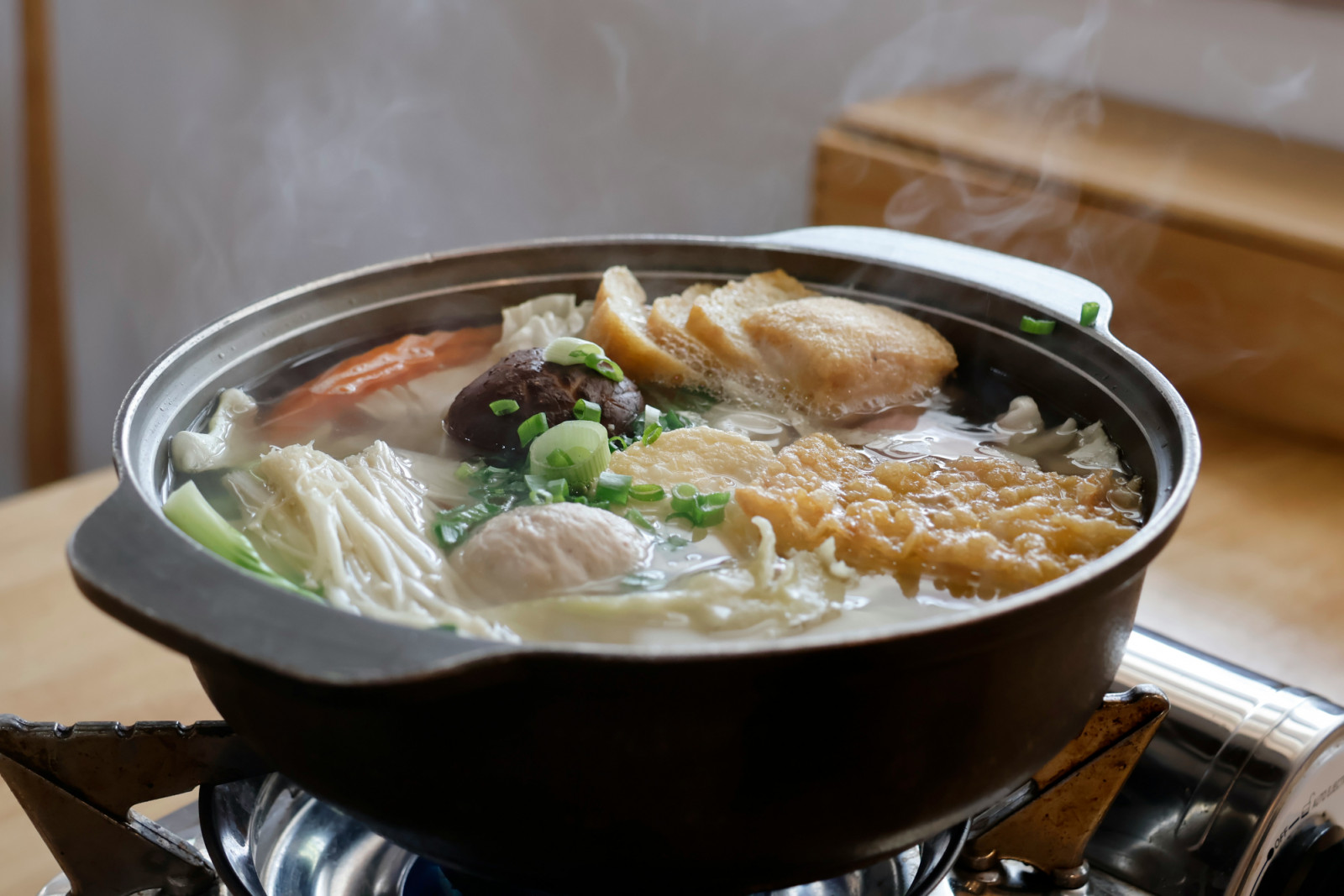 Hot pot culture transformed the medicinal broth into social dining, where families and friends dip, cook and eat communally (Photo: You Le / Unsplash)