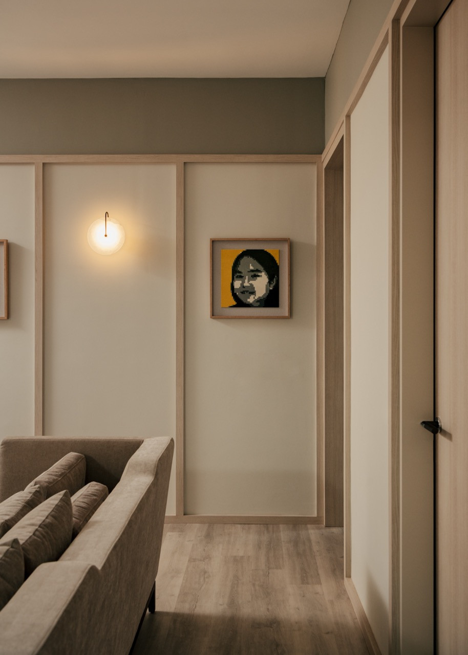 The Lego room features timber panelling in lighter tones appropriate for the daughters’ space, with built-in storag