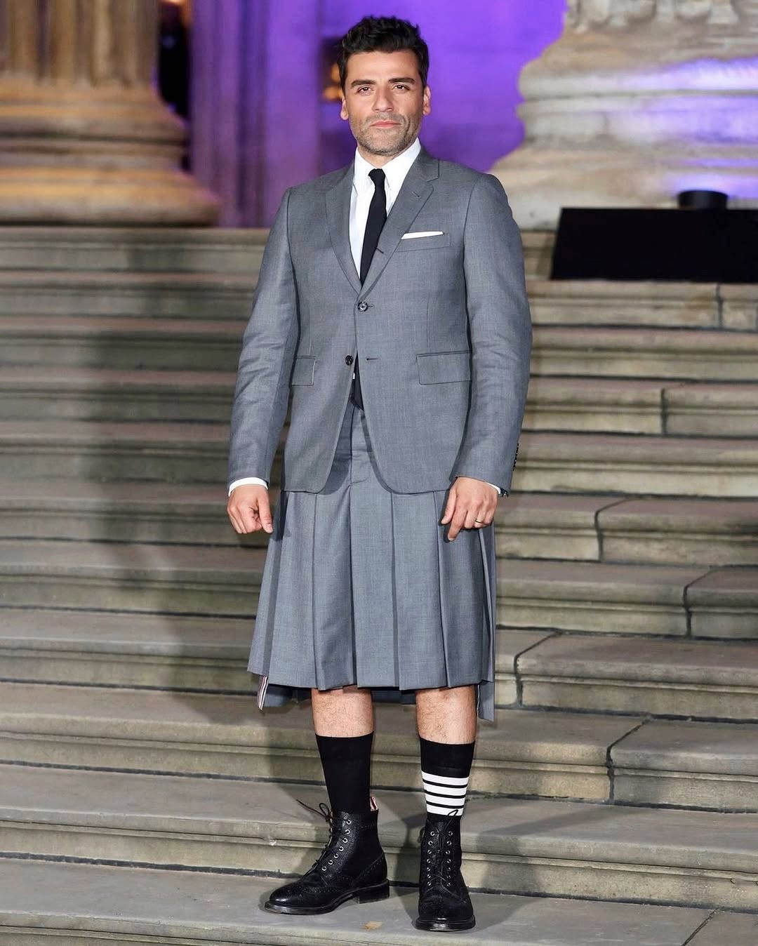 Slate grey blazer and matching pleated skirt by Thom Browne (Photo: Instagram / @thombrowne)