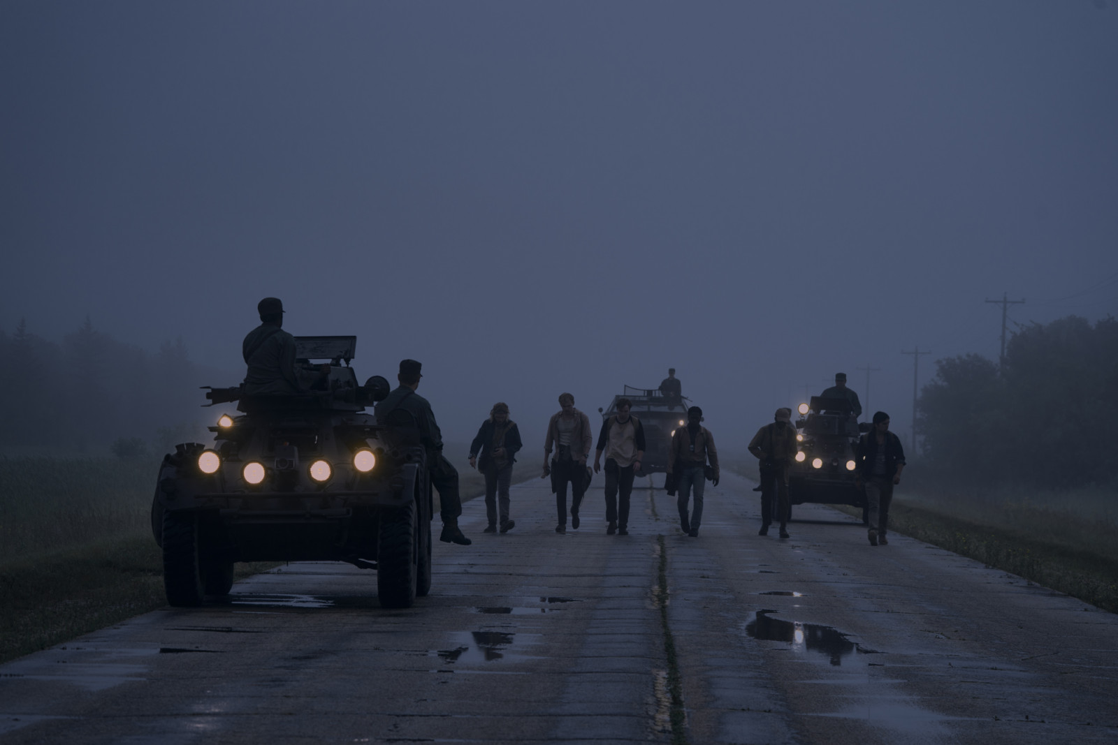 Charlie Plummer as Barkovitch, Garrett Wareing as Stebbins, Cooper Hoffman as Garraty, David Jonsson as McVries, Tut Nyuot as Baker, and Joshua Odjick as Parker in The Long Walk. (Photo: Murray Close/Lionsgate)
