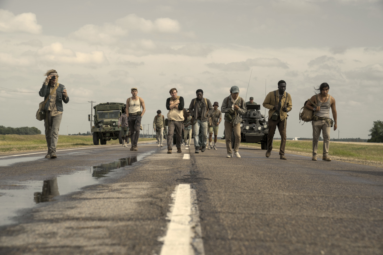 Charlie Plummer as Barkovitch, Garrett Wareing as Stebbins, Cooper Hoffman as Garraty, David Jonsson as McVries, Ben Wang as Olson, Tut Nyuot as Baker, and Joshua Odjick as Parker in The Long Walk. (Photo: Murray Close/Lionsgate)
