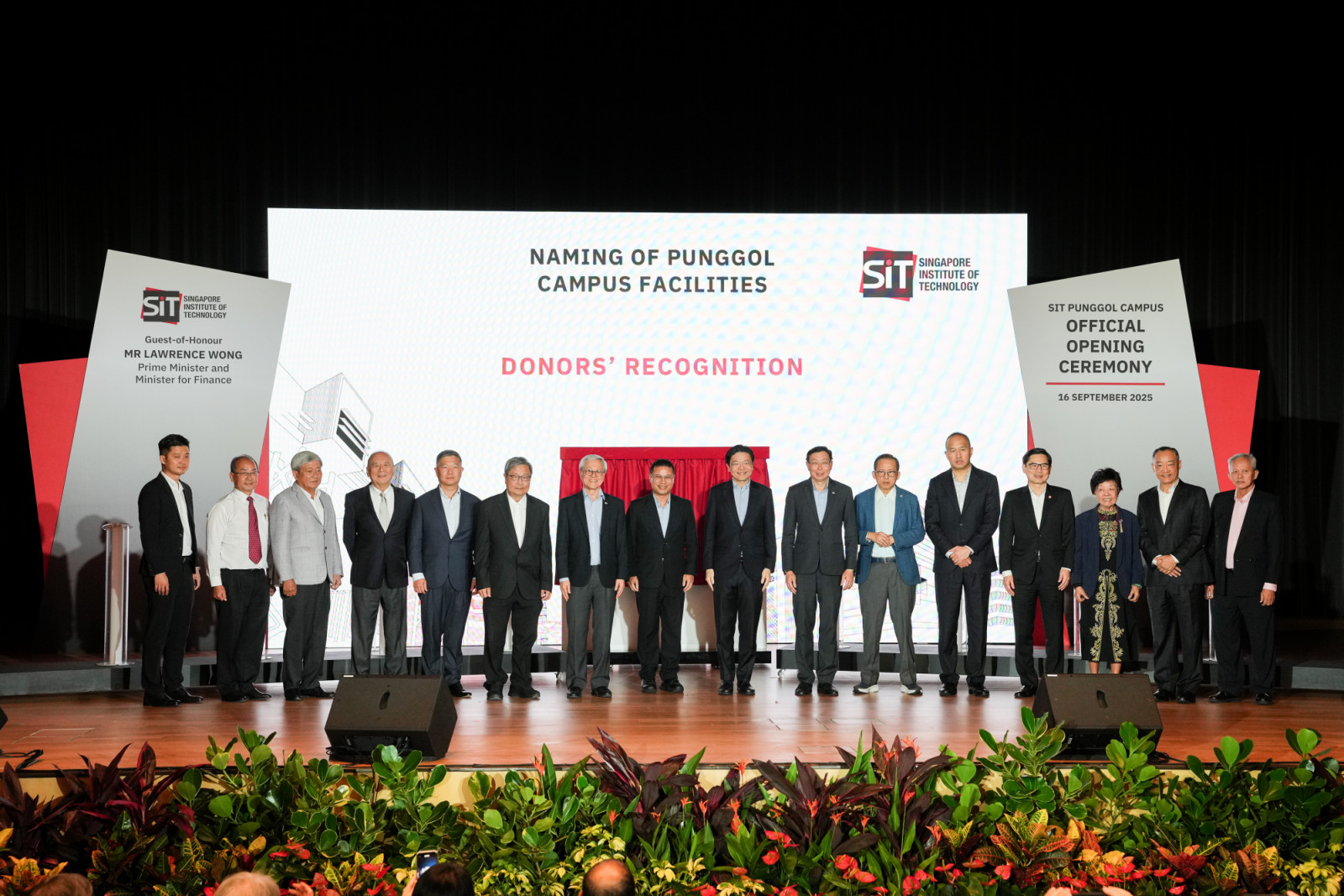 Prime minister Lawrence Wong, minister for education and minister-in-charge of social services integration Desmond Lee, chairman of SIT board of trustees Bill Chang and SIT president professor Chua Kee Chaing with key donors, including Kwek Leng Beng (pictured sixth from right)and Sherman Kwek (fifth from right), at the official opening of the SIT Punggol campus