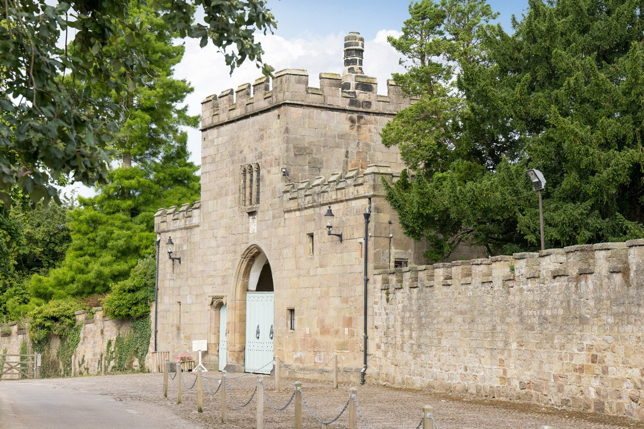The 1450s gatehouse at Ripley Castle providing the impressive medieval entrance approach to this historic European castle, demonstrating the defensive architecture from the castle’s earliest period