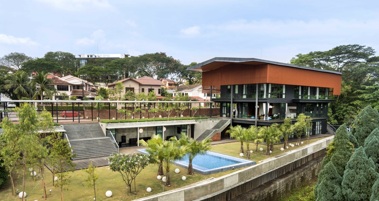 Neighbourhood view showing stacked horizontal planes with timber screens providing solar shading