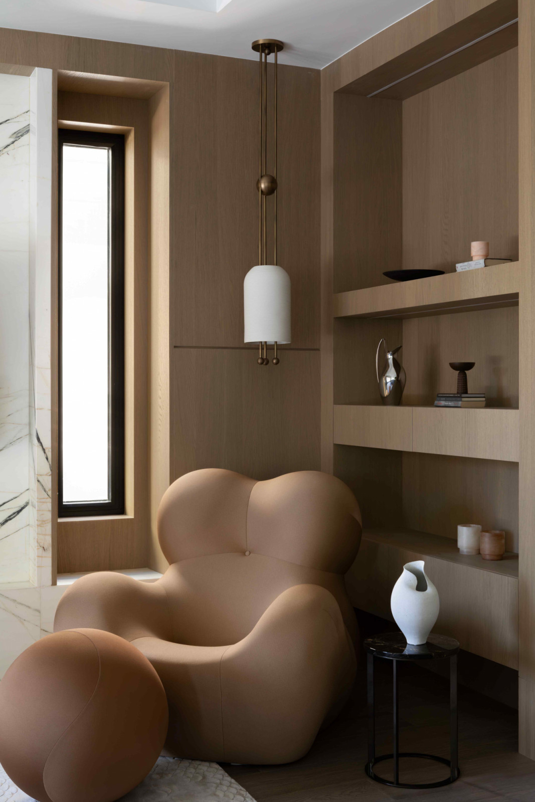 The sculptural B&B Italia Serie Up armchair by Gaetano Pesce anchors the space