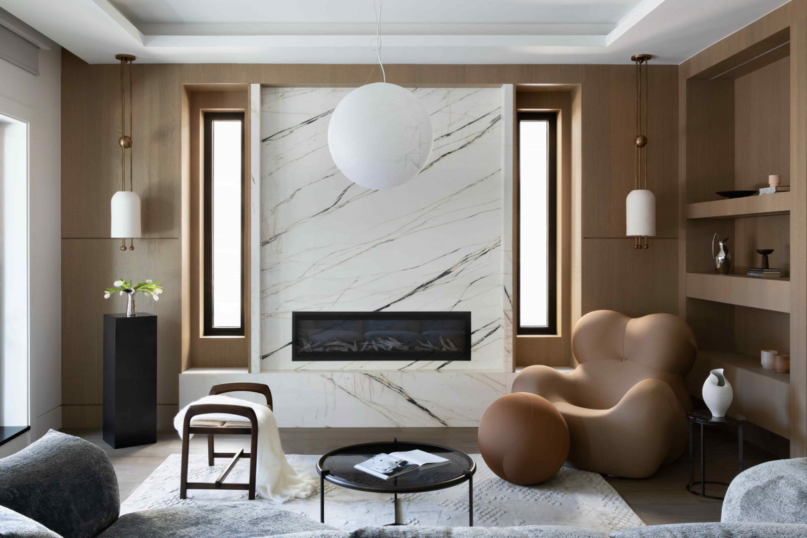 The family room on the main floor with Shinnoki Manhattan oak panels