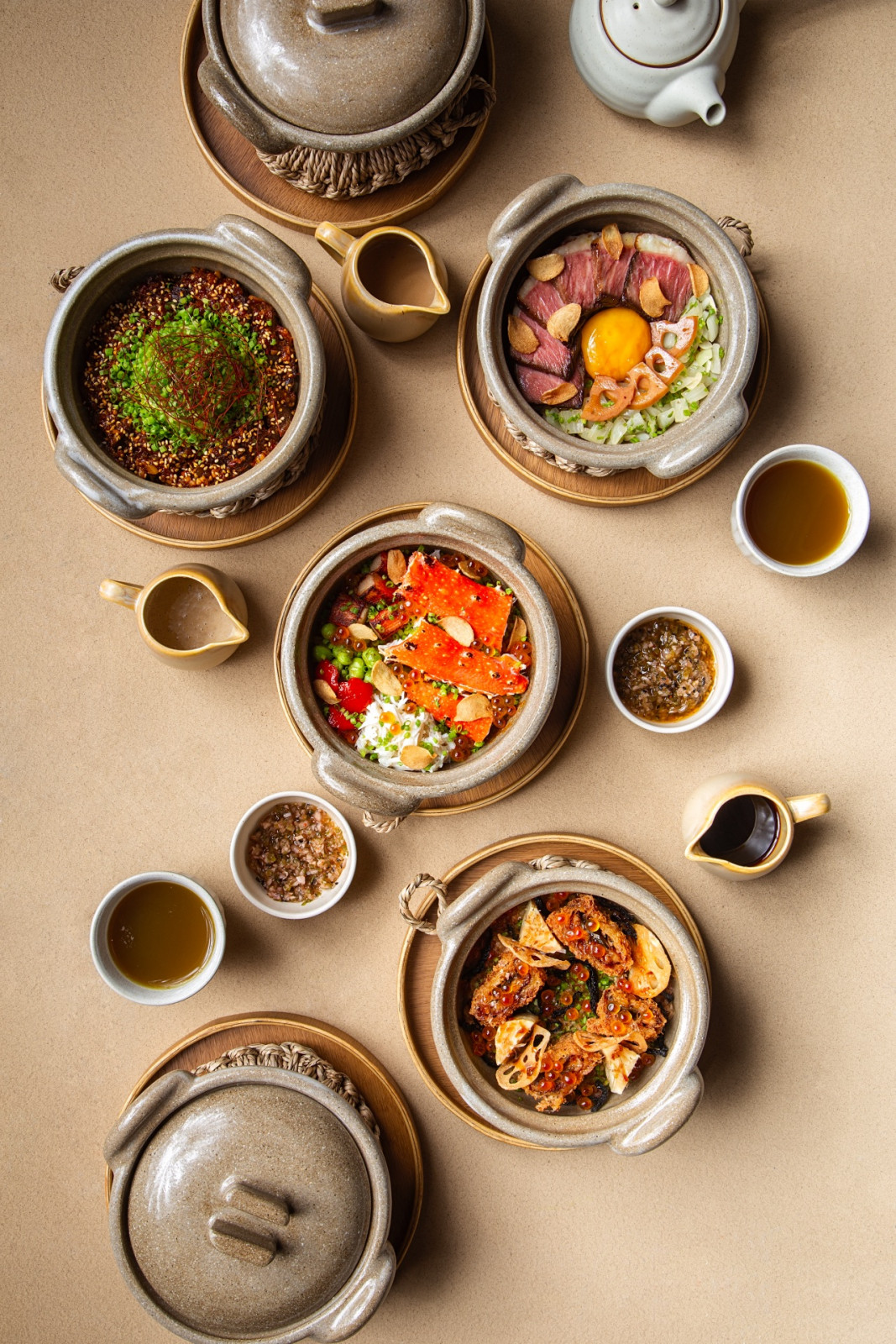 Tatler - (L-R) SPICY BEEF AND TENDON X.O, WAGYU SHORTRIB, KING CRAB CLAW AND UNAGI FISH AND CHIPS