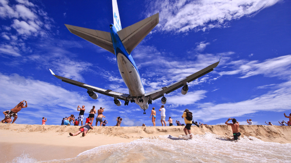 From Himalayan valleys to Caribbean beaches, these unusual airport runways reveal how aviation adapts to some of the world’s most challenging landscapes. (Photo: Visit St. Maarten)