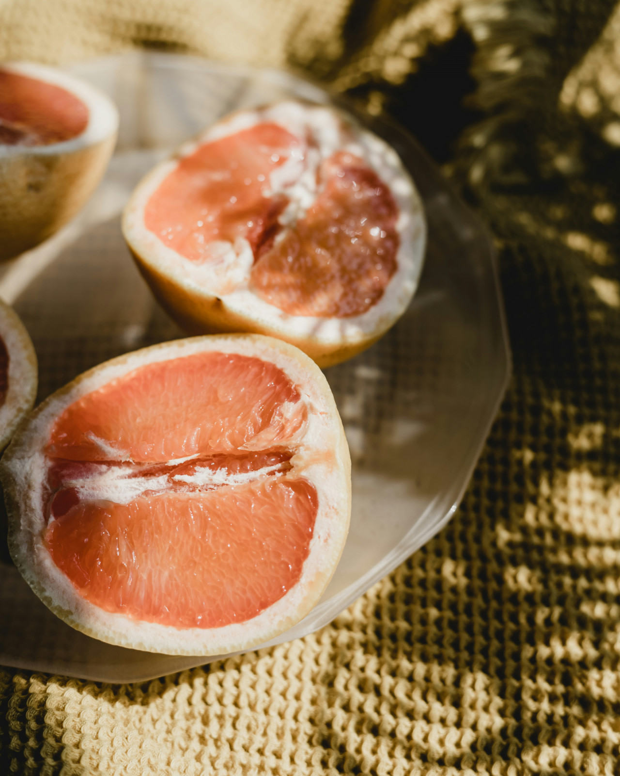 The Cantonese word for “pomelo” (柚, yòu) sounds like “bless” (佑), making them lucky gifts. (Photo: Georgia de Lotz/Unsplash)