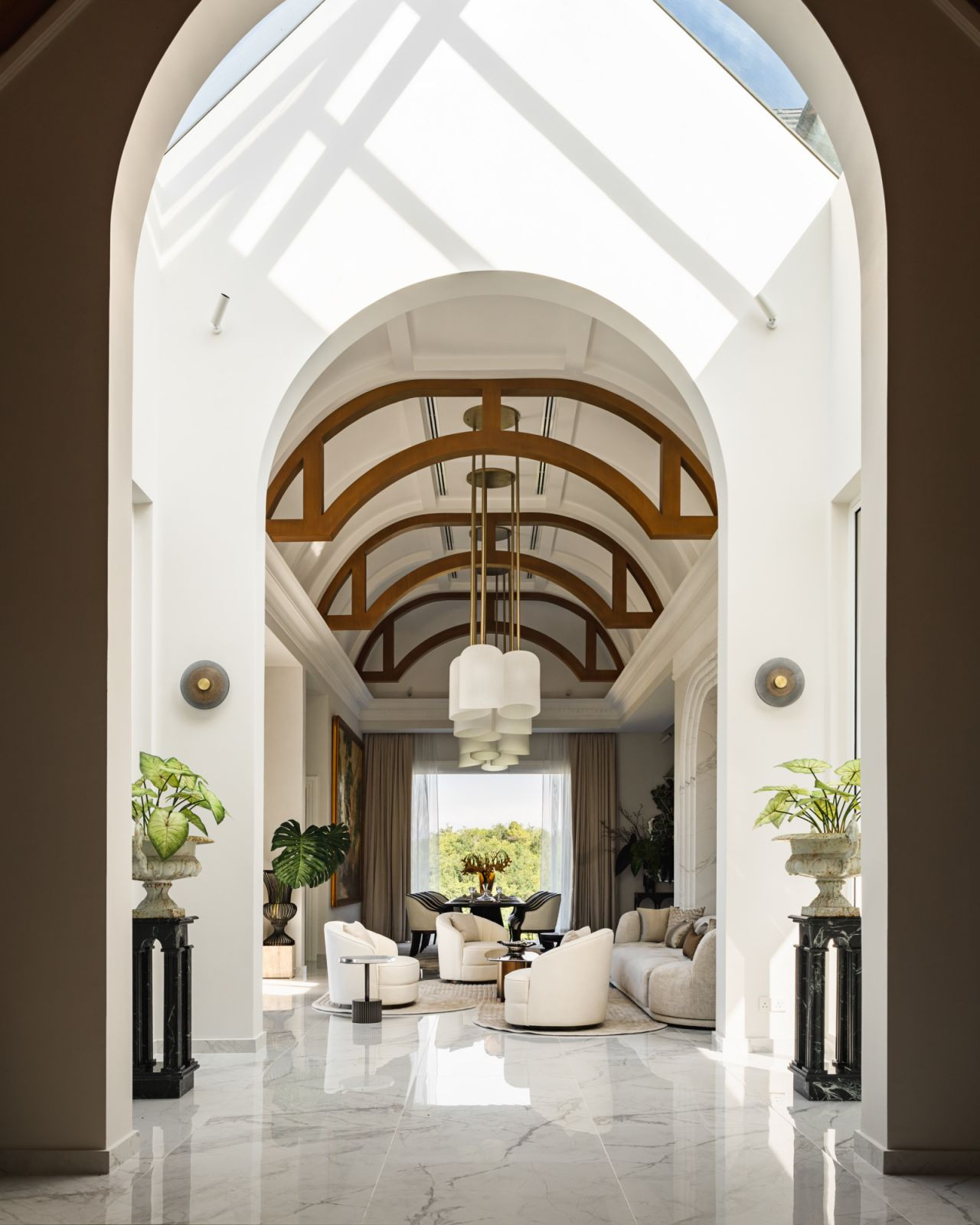 The dramatic barrel ceiling spanning the living and dining areas exemplifies IDent_3’s approach to bringing the soaring skies indoors  (Photo: The Space Storyteller)
