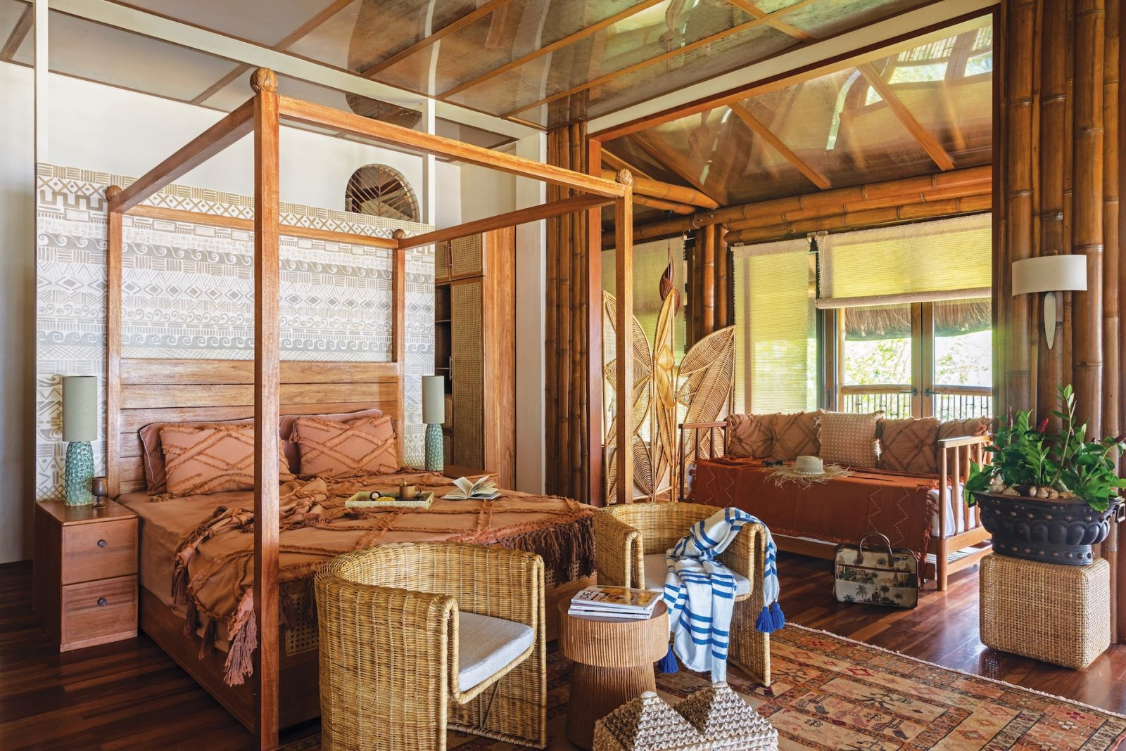 The bedroom at Aman Sinaya on Mati Island in Davao Oriental, Mindanao, where a four-poster bed by Grosswood serves as the focal point of the space (Photo: Scott A Woodward)