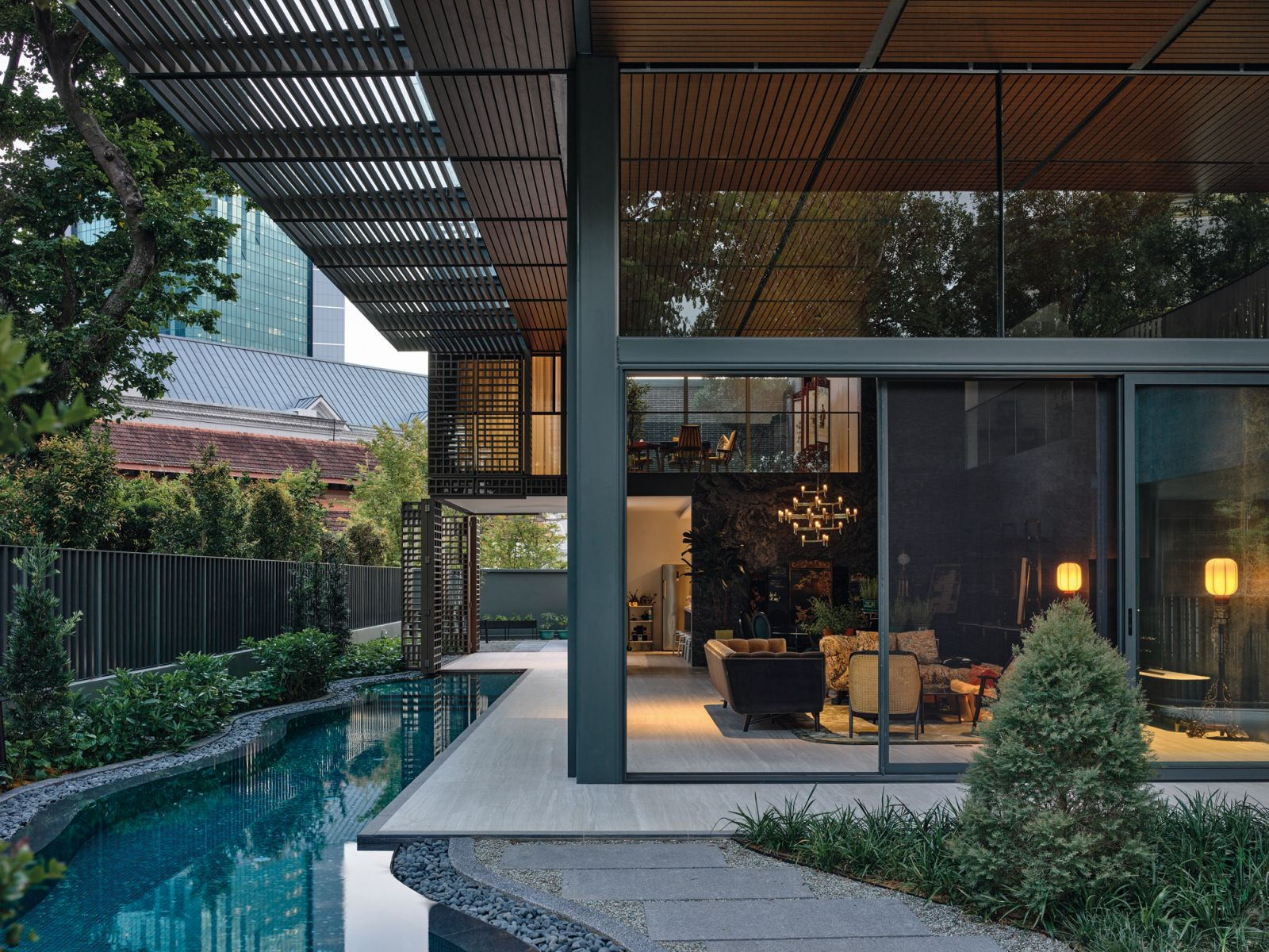 Vernacular materials evoke the look and feel of a traditional Chinese courtyard house, providing a fitting backdrop to the carefully curated furniture and the owners’ extensive collection of cultural and religious antiques (Photo: Derek Swalwell)