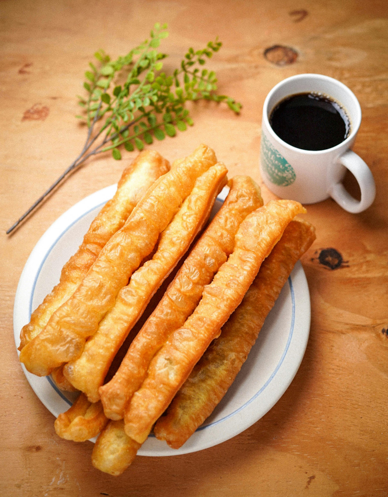 Did you know that the youtiao likely preceded the doughnut? (Photo: Jamie Saw / Pexels)