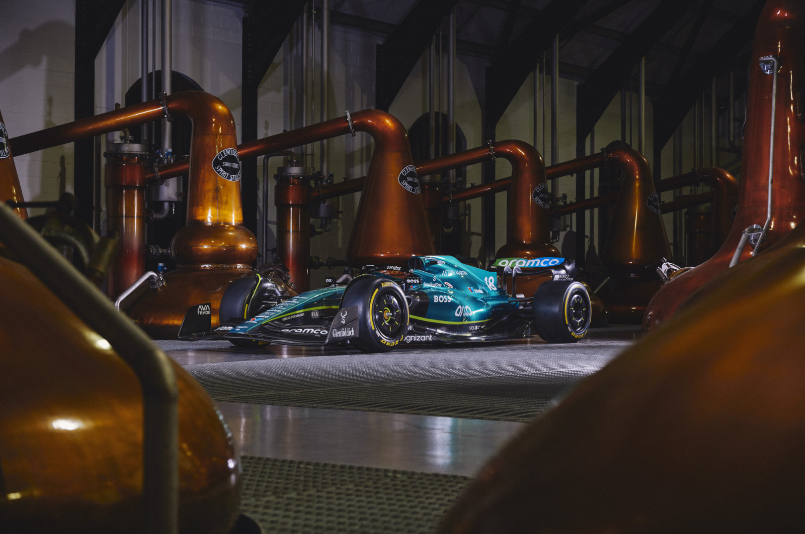 The Aston Martin AMR24 is showcased inside the historic Still House at the Glenfiddich Distillery in Keith, Scotland (Photo by Guido De Bortoli/Getty Images for Glenfiddich)