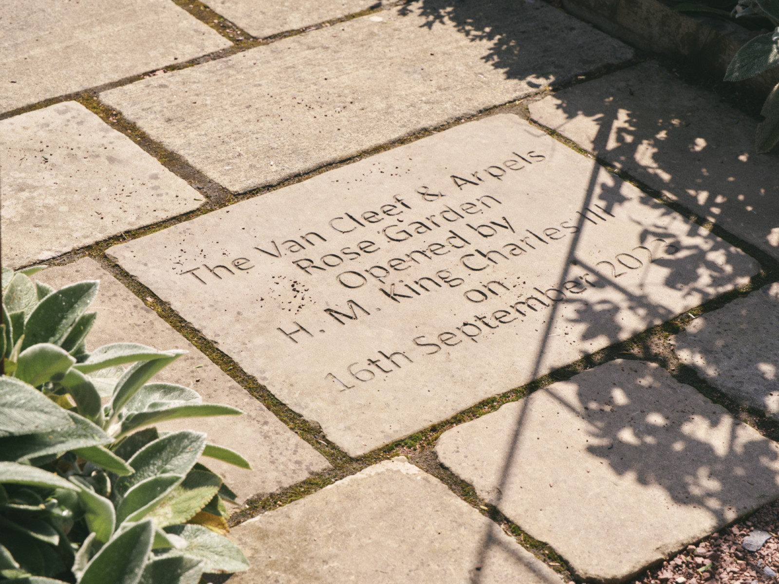 A tile inscribed at the entrance of the Van Cleef & Arpels rose garden at Dumfries House (Photo: courtesy of Estelle Hanania / Van Cleef & Arpels)