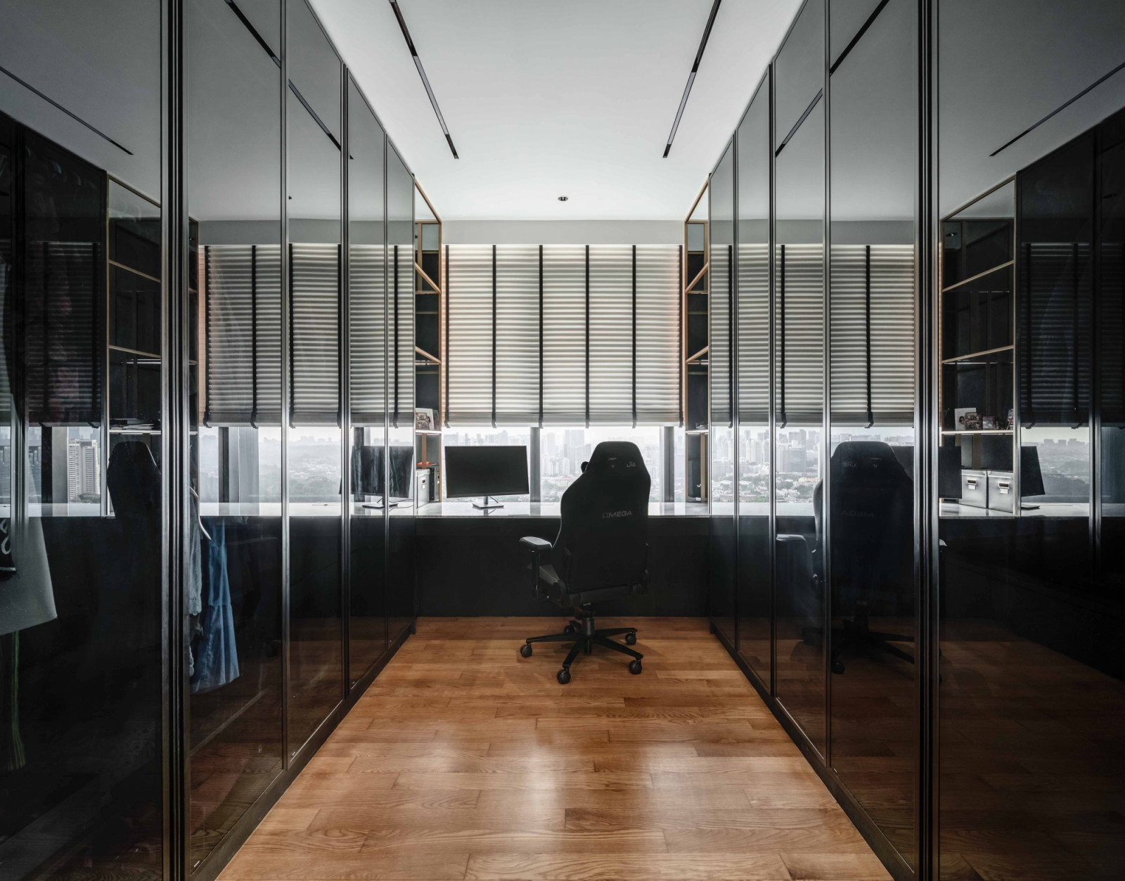 The space between the wardrobes was cleverly converted into a study with a view