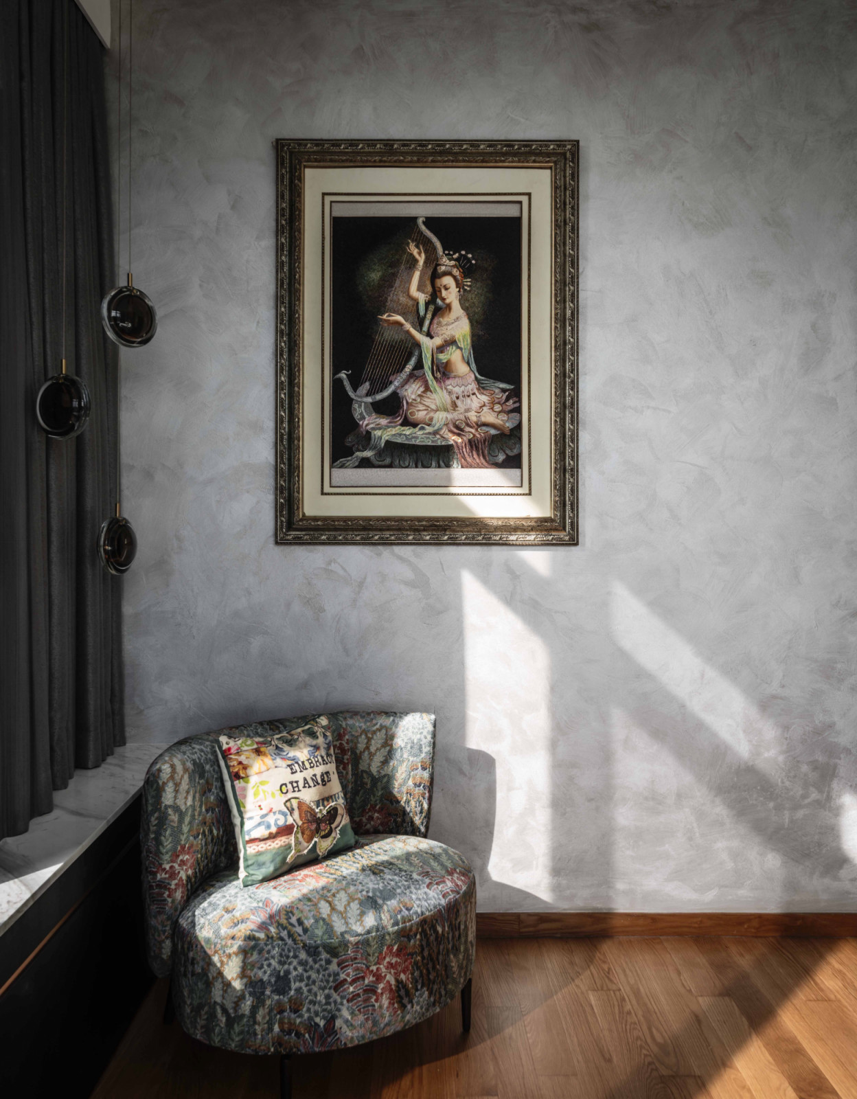 A plushly decorated corner enjoys a dramatic play of light