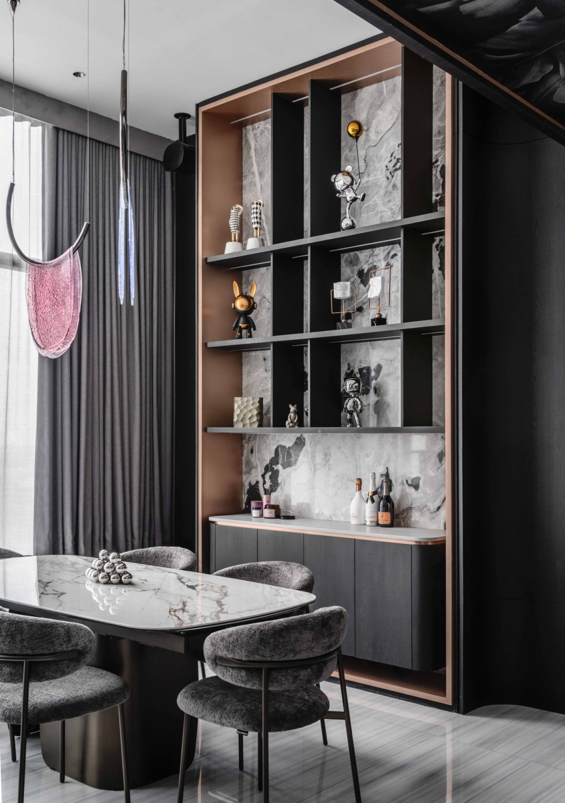 Subtle pink touches, like the glass panels of the pendant light, serve as sweet feminine touch points in the colour palette