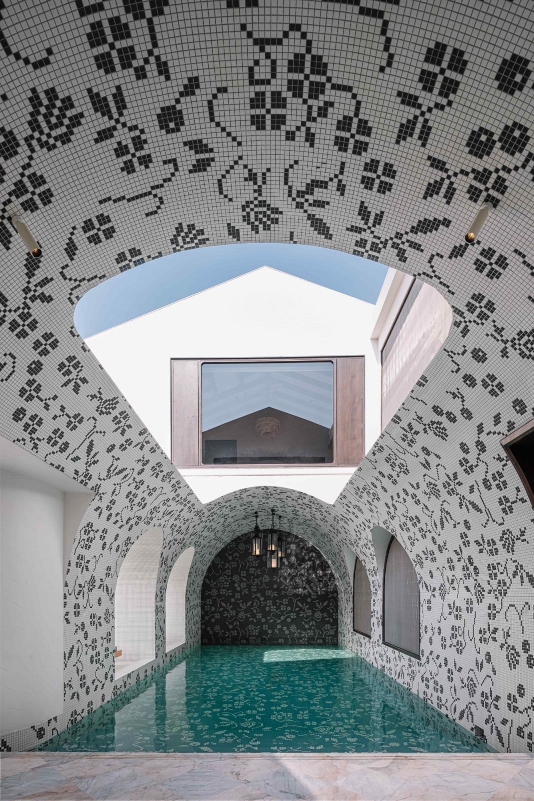 The 77-foot vaulted pool is a theatrical experience
