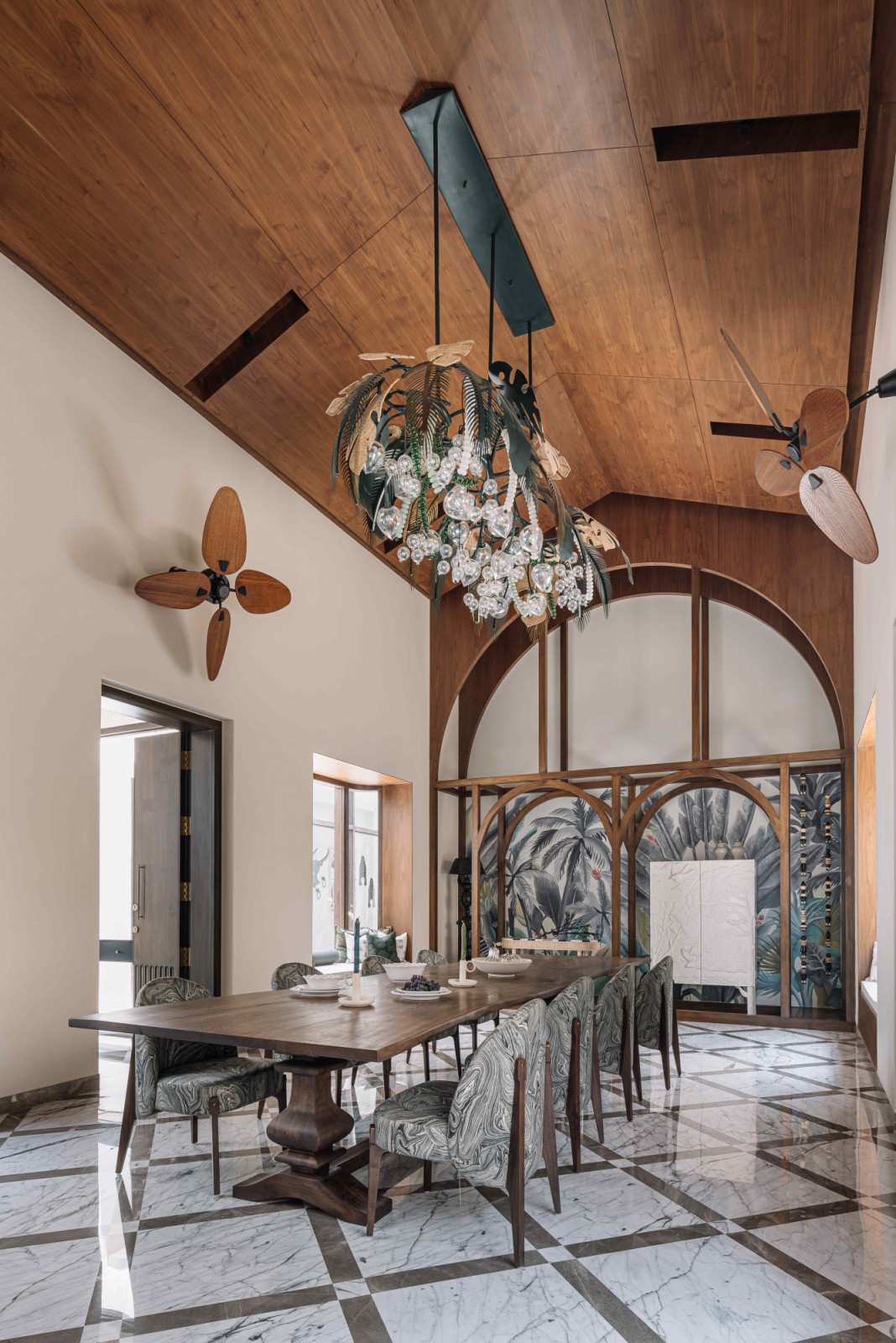 The lofty dining area welcomes guests