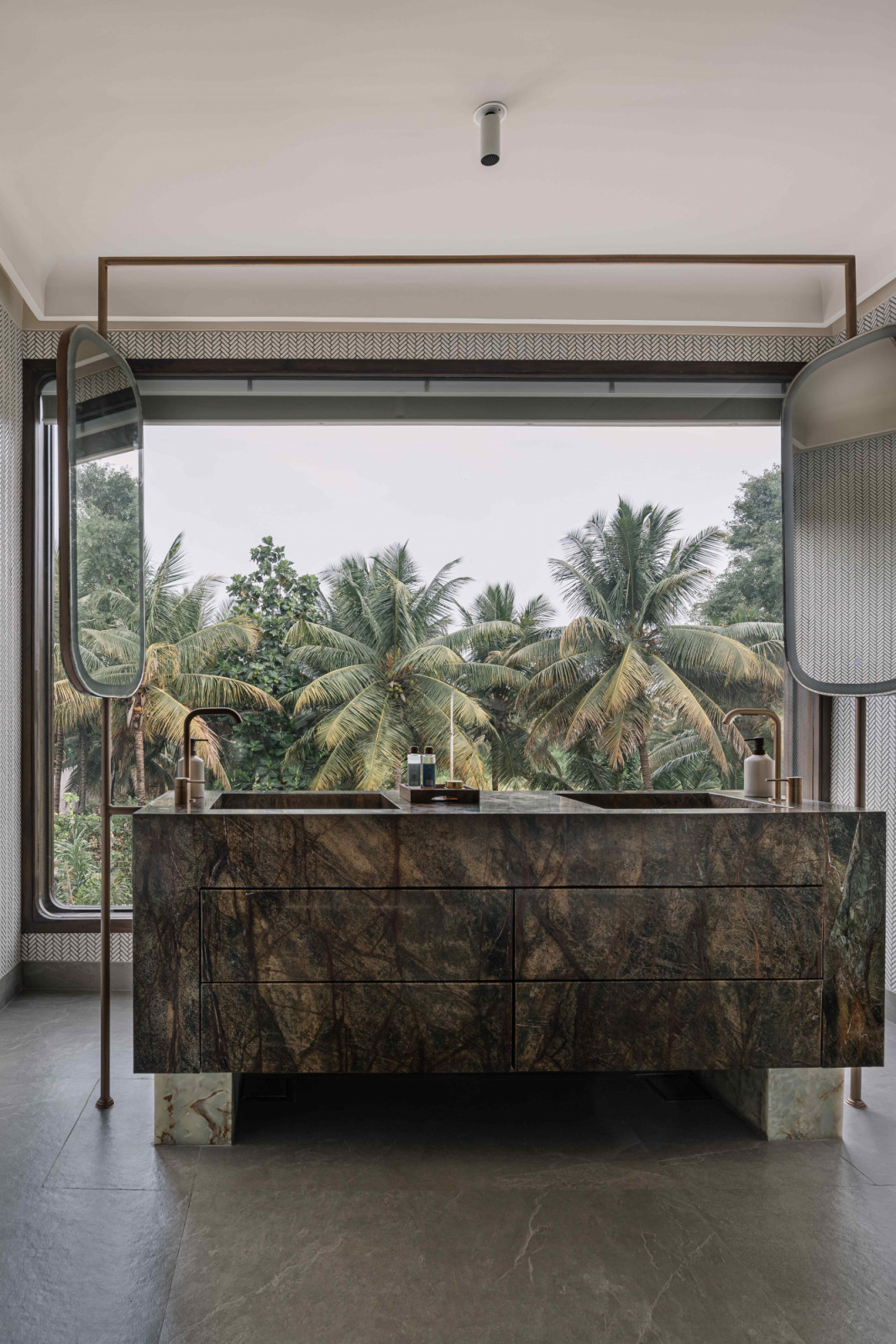 The large picture window invites the outdoors inside