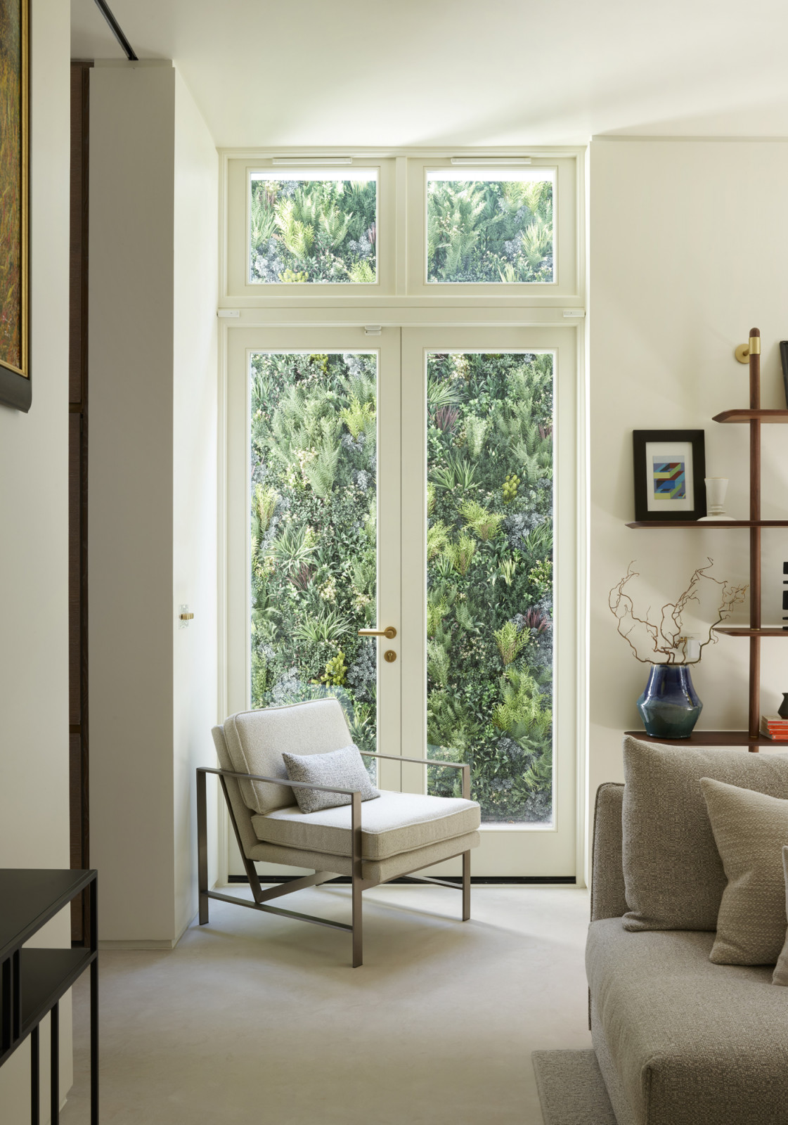 Glimpses of the light wells and verdant greenery in a Kensington, London home designed by Boundary Space