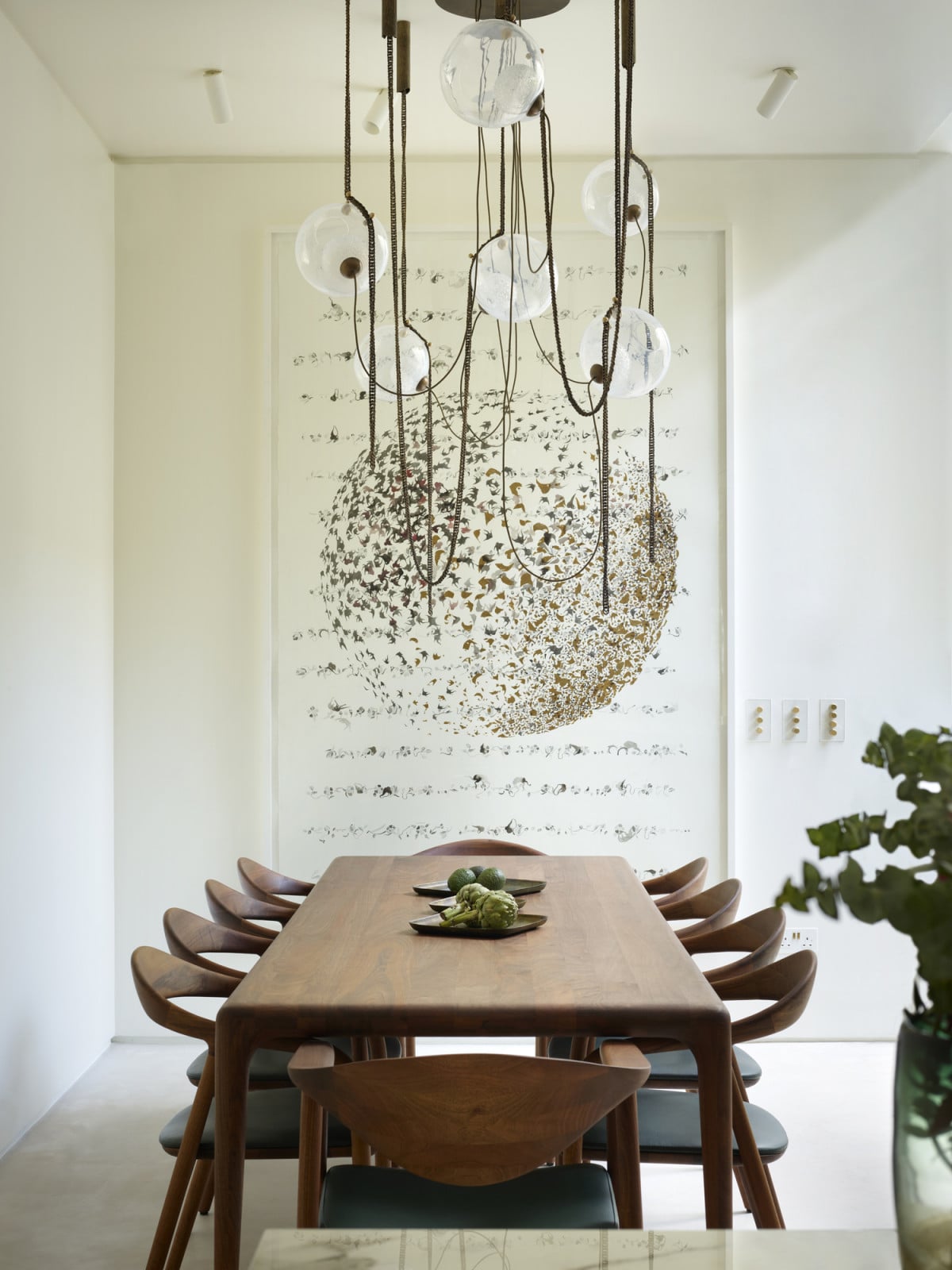 The dining room on the basement level of a Kensington, London home designed by Boundary Space