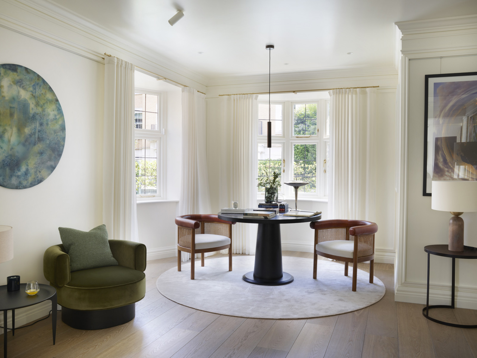 The unique art and furniture on display at the salon of a Kensington, London home designed by Boundary Space