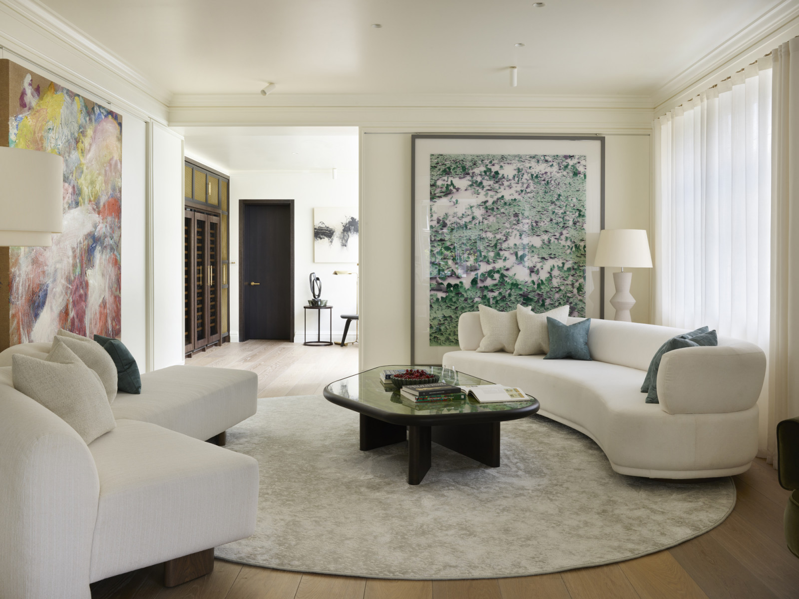 The unique art and furniture on display at the salon of a Kensington, London home designed by Boundary Space