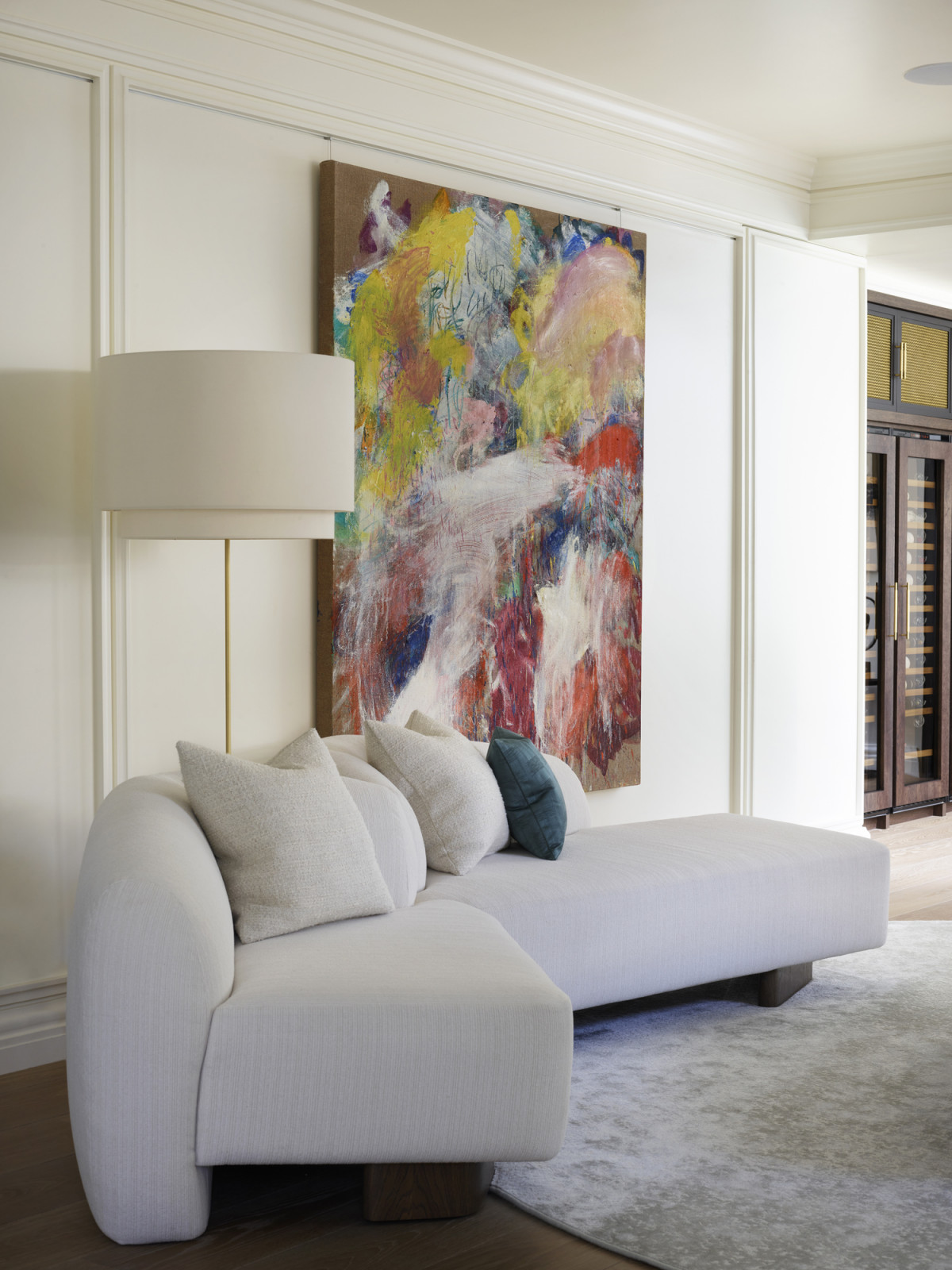 The unique art and furniture on display at the salon of a Kensington, London home designed by Boundary Space