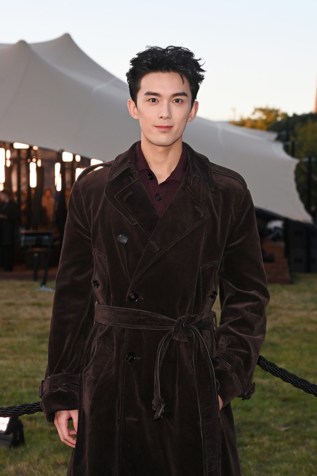 LONDON, ENGLAND - SEPTEMBER 22: Wu Lei arrives at the Burberry Summer 2026 show during London Fashion Week on September 22, 2025 in London, England. 

Photo by Dave Benett